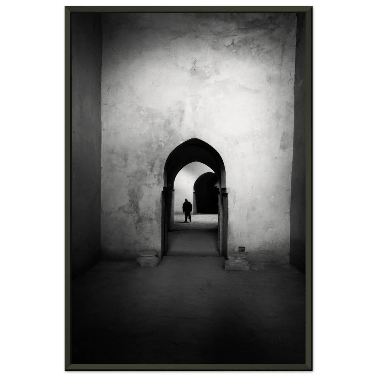 Sequence of dramatic gothic point arches creating depth and shadows in Morocco - Fine art photography print by Paulo Côrte-Real