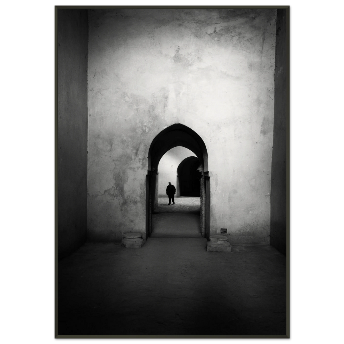 Sequence of dramatic gothic point arches creating depth and shadows in Morocco - Fine art photography print by Paulo Côrte-Real