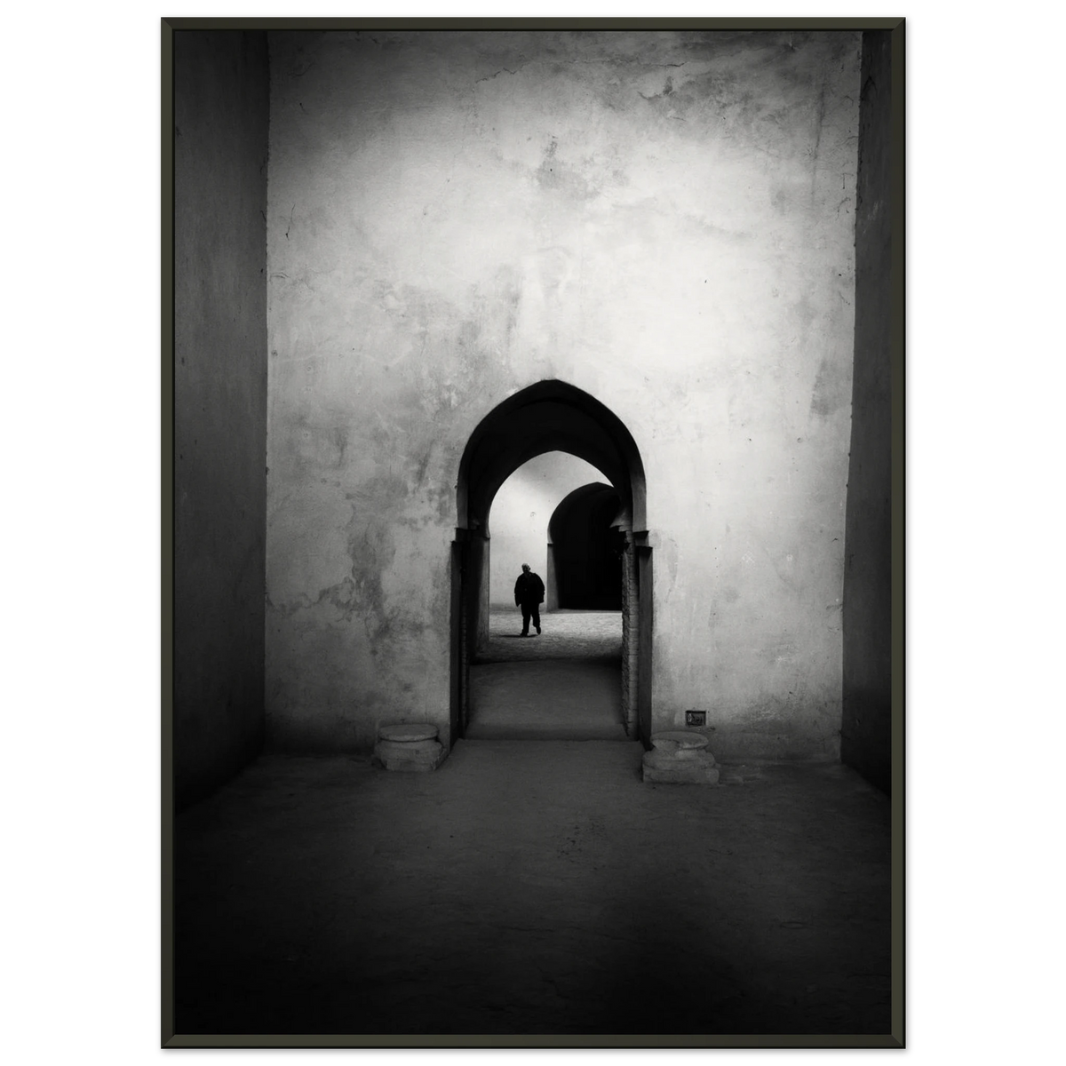Sequence of dramatic gothic point arches creating depth and shadows in Morocco - Fine art photography print by Paulo Côrte-Real