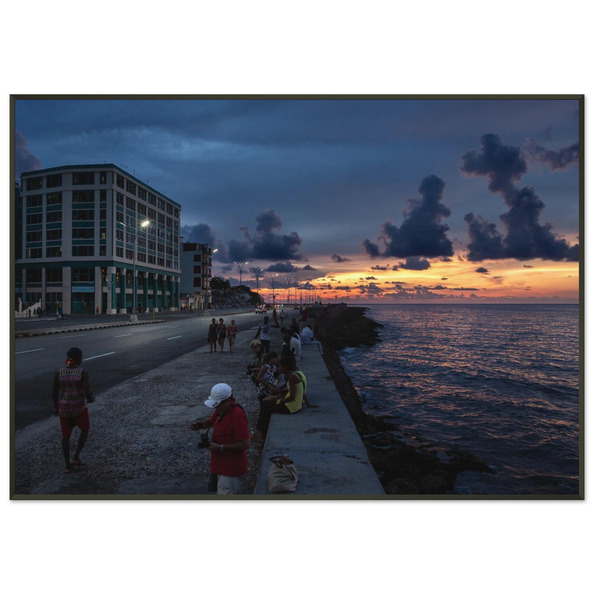 Atmospheric sunset view along the iconic seaside avenue in Havana, Cuba - Fine art street photography print by Paulo Côrte-Real
